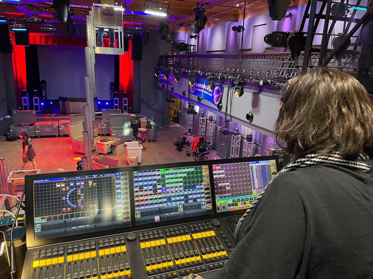 Club scene moving-lights rig in mid-build