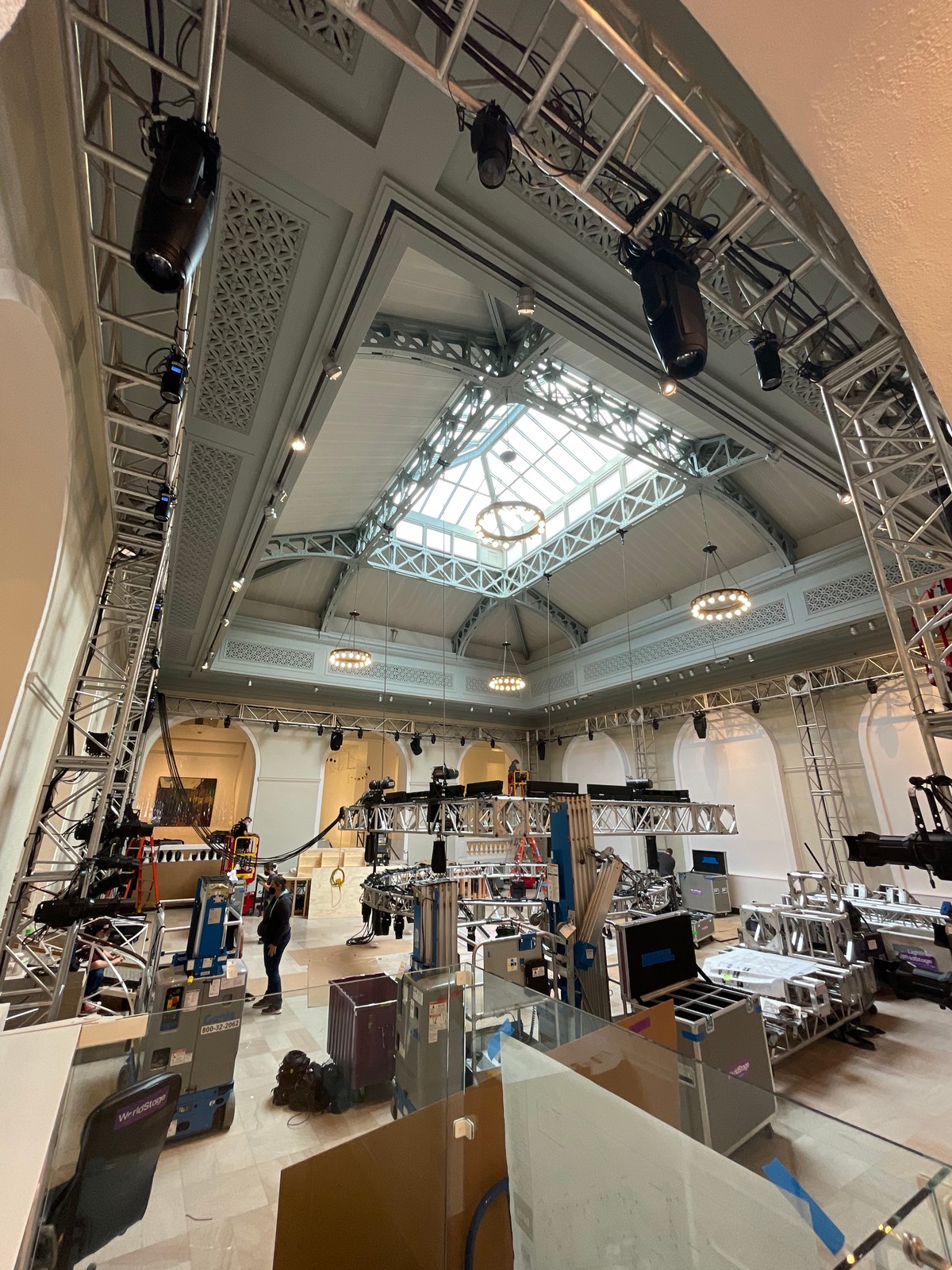 Moving-lights truss being installed in the ballroom set