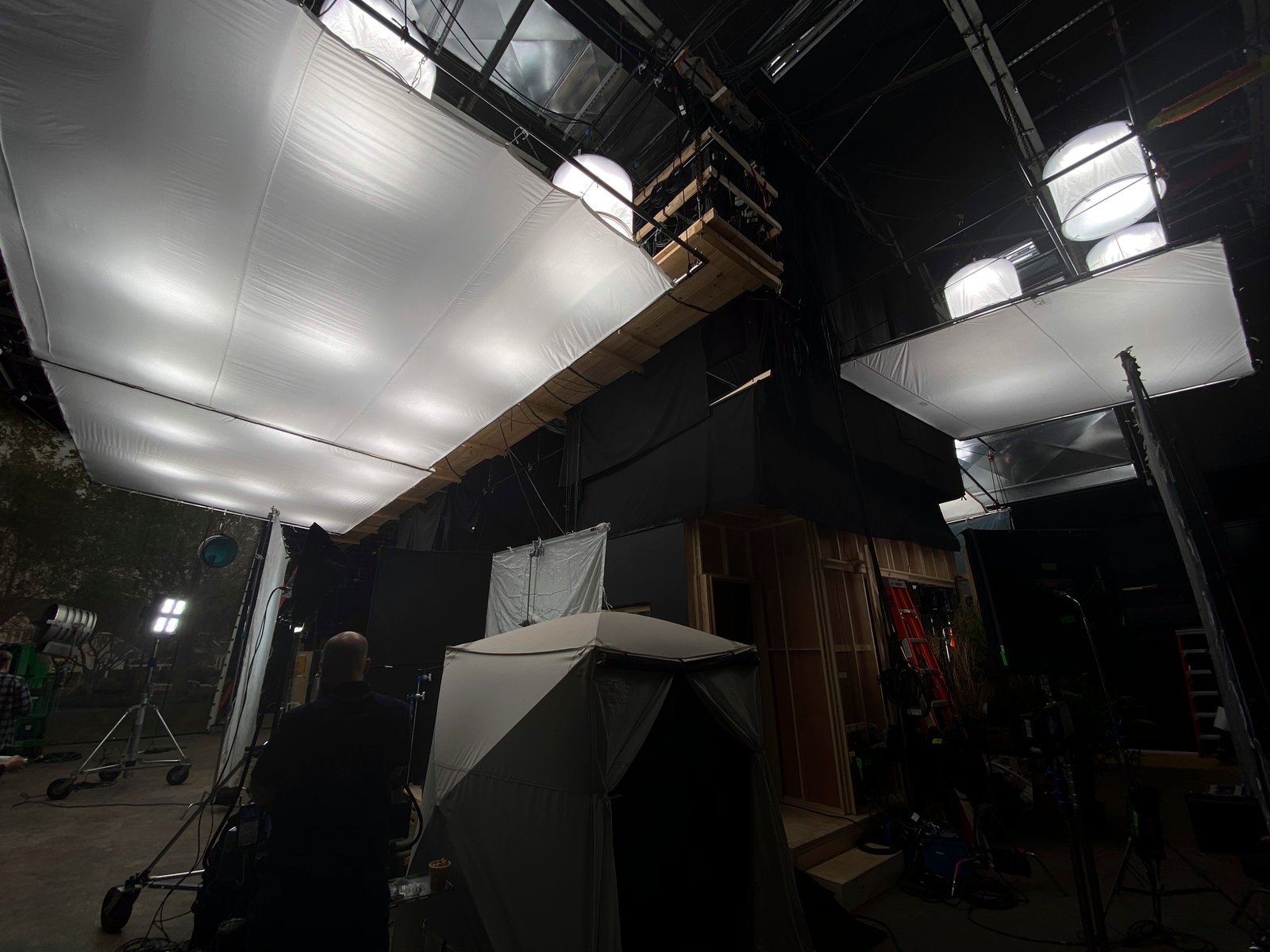Stage overhead diffusion rig — large-format butterfly frames — Monsterland