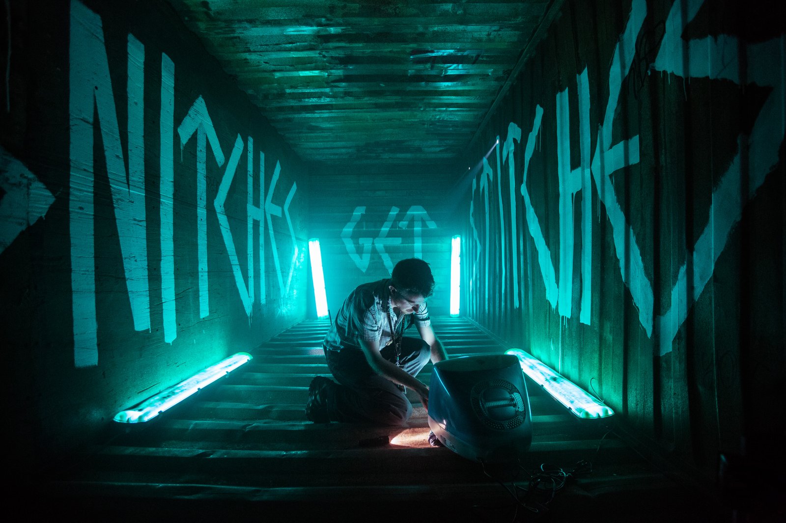 Custom on-set light fixture rigged into a shipping-container set — Nerve (Lionsgate)