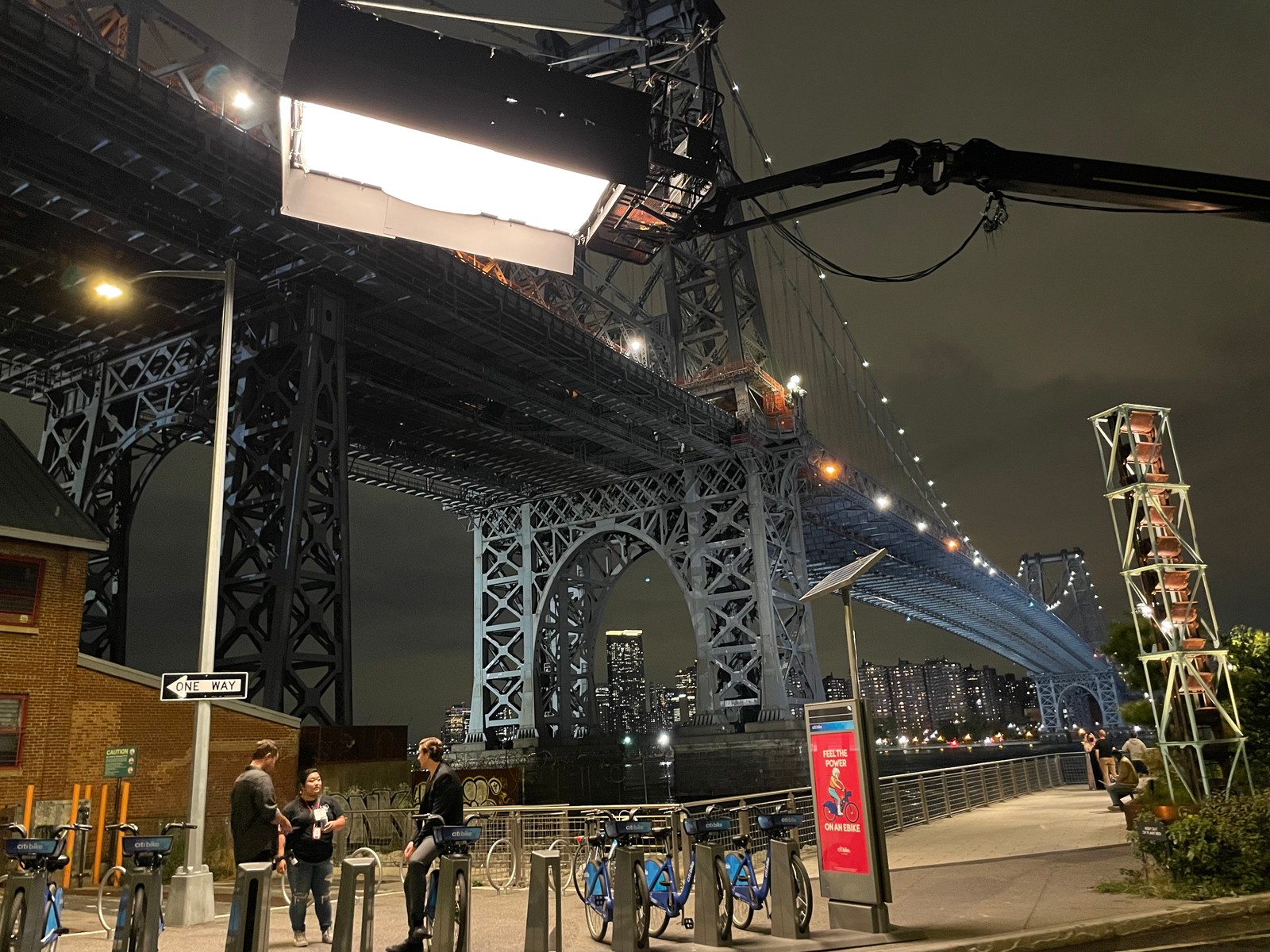 Lighting rig under the Williamsburg Bridge for a night exterior